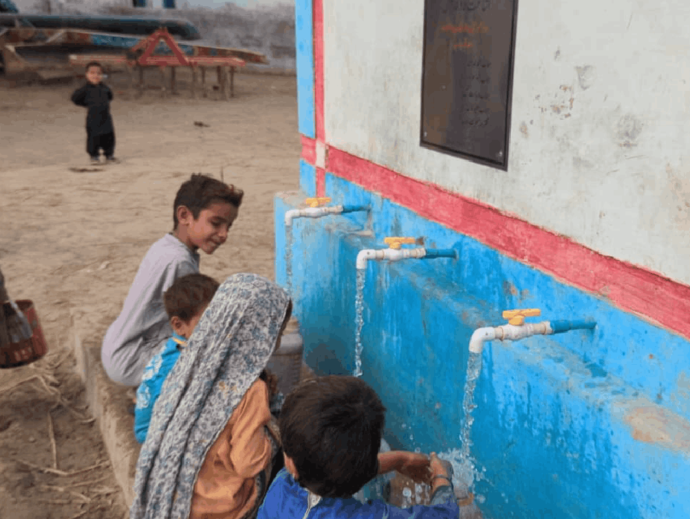 Poor kids benefited from a water charity from a solar submersible clean water storage tanker.