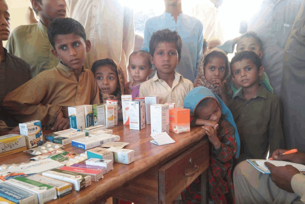 donations Poor kids receiving aid from an emergency relief donation.