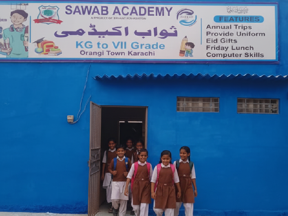 Happy students coming out from Sawab Academy School building of Eshaat Foundation.