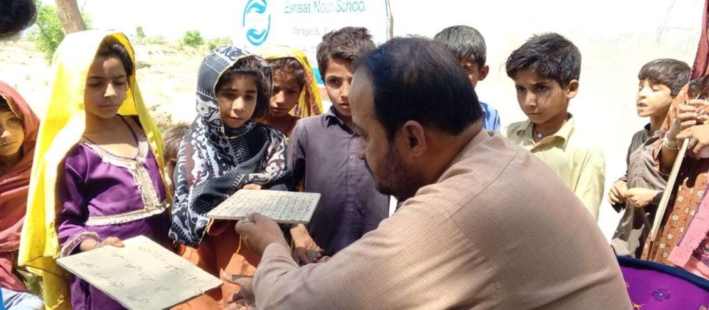 Teachers give individual attention to students' work to keep them in school and out of child labor.