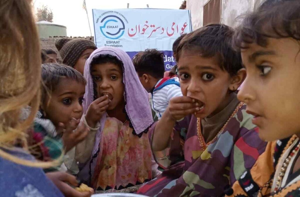 Poor kids are eating meals donated by donors who donate food to needy families.