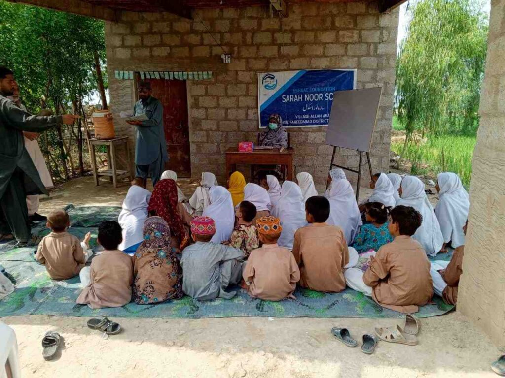 Poor children studying in Eshaat free schools, supporting the early education of kids.