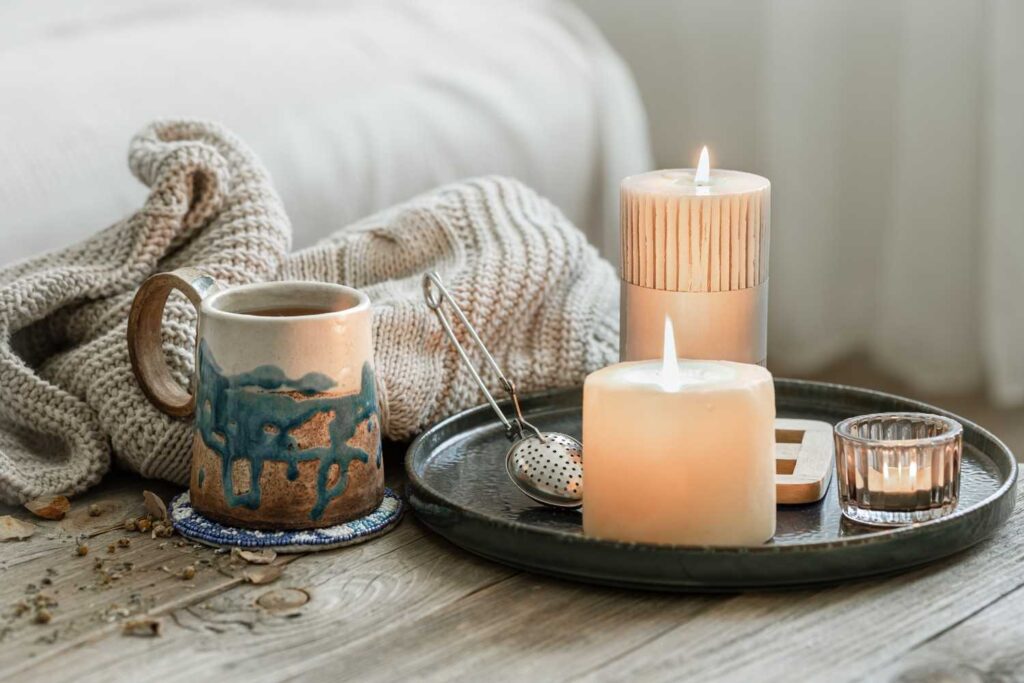 Scented candle glowing, representing best Eid gift.